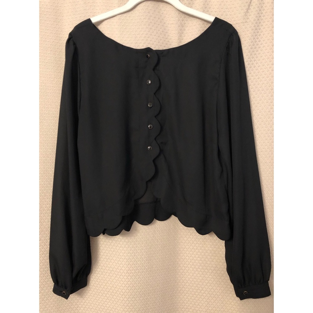 Black blouse with scallop trim and buttons